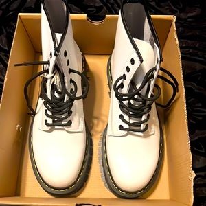Smooth leather Dr. Martens. White color never worn, new in box with tags.